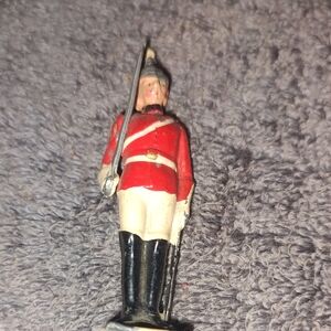 Vintage Soldier Figurine in Red and Black